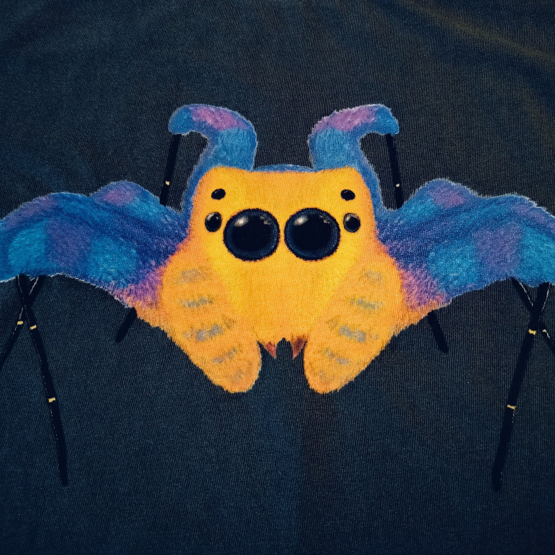 Illustration of a blue Portia jumping spider with black feet on a dark background