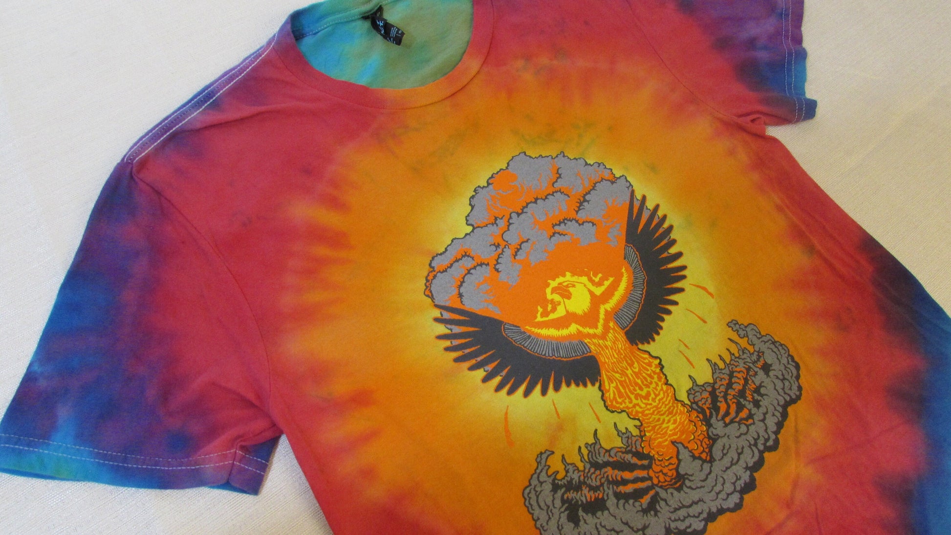 Phoenix atom bomb on a Tie dyed shirt top left skew