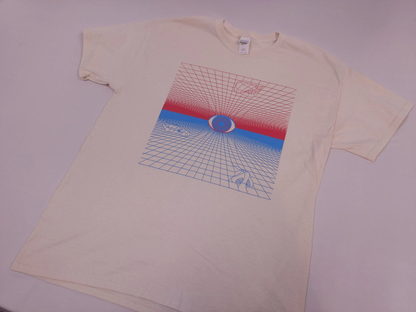 Beige t-shirt with a graphic design on a white background