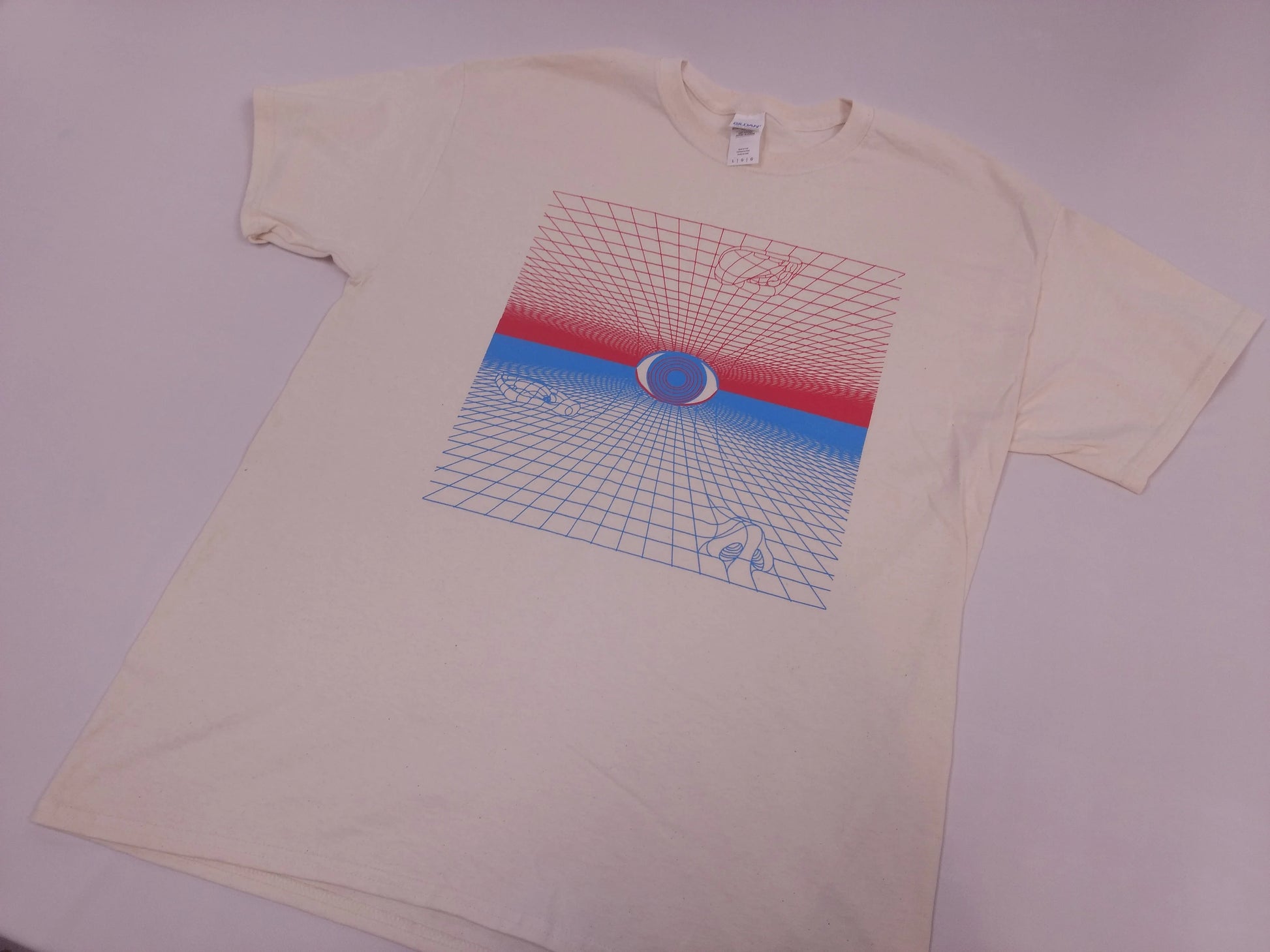 Beige t-shirt with a graphic design on a white background