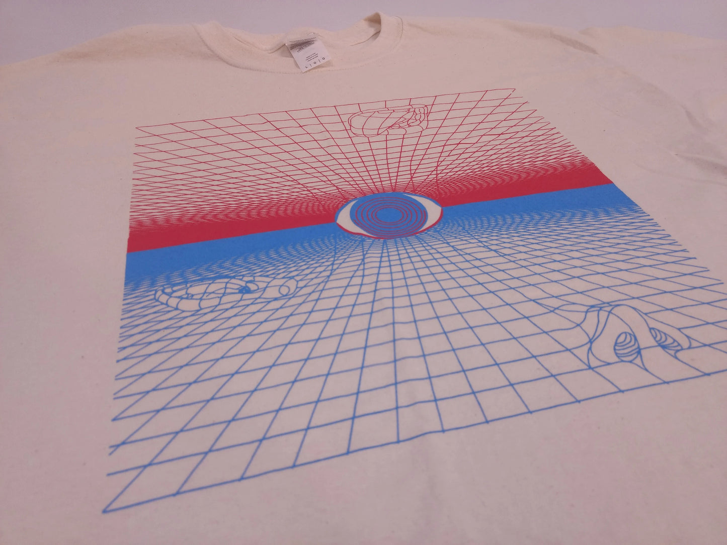 T-shirt with a grid design and abstract senses on a plain background